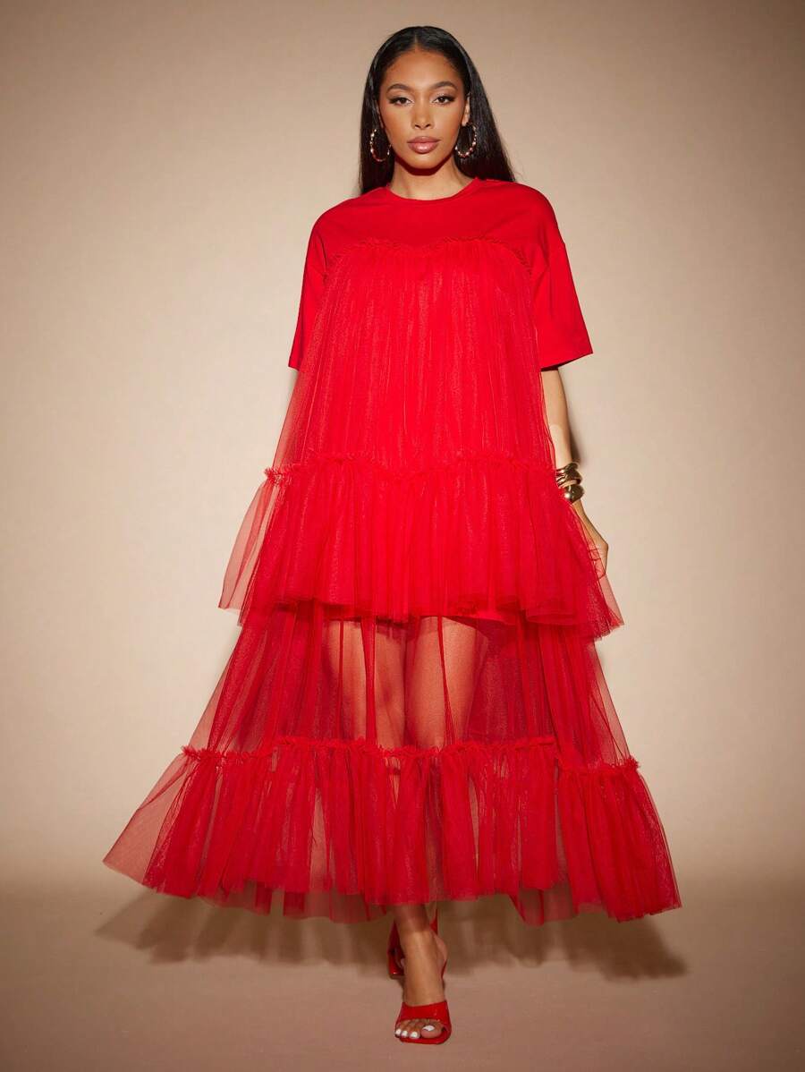 Twirl into festival season with this dreamy boho tulle maxi dress that's equal parts whimsical and effortlessly chic. Layered tiers create romantic movement with every step, while the flowing silhouette keeps you cool and comfortable under the summer sun. Perfect for music festivals, garden parties, or any occasion calling for bohemian vibes. Pair it with your favorite sandals and let your free spirit shine.