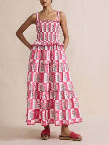 Unleash your inner flower child with our Boho Vintage Floral Summer Sundress! Perfect for a day at the beach, this sleeveless dress features ruffles that add a playful touch. Spread good vibes and turn heads with this must-have piece. (Limited quantities available!)