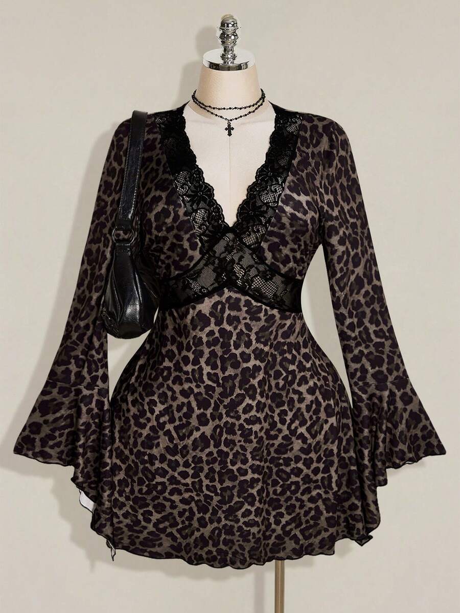 Front view of brown leopard print mini dress with black lace V-neck and long flared sleeves