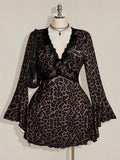 Front view of brown leopard print mini dress with black lace V-neck and long flared sleeves