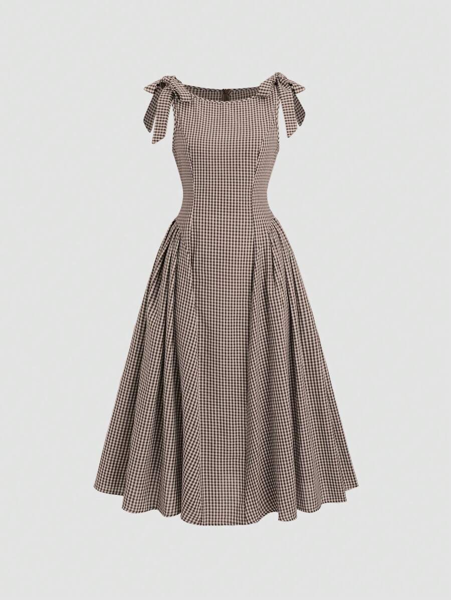 View 1 of brown gingham bow strap midi dress with square neckline, ruffle trim, fitted bodice, and flared skirt