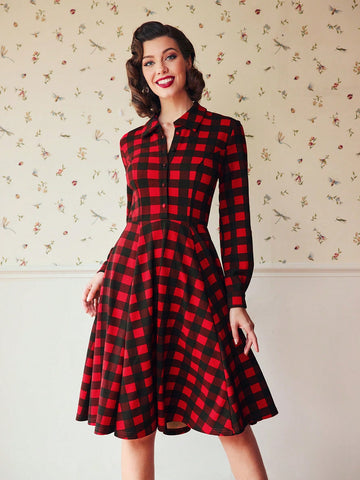 Get ready to rock your retro fashion game with the Buffalo Plaid Button-Front Flare Hem Dress! Its timeless charm effortlessly blends with cozy style, making it perfect for any occasion. Button it up for a chic look or unleash your playful side and pair it with your favorite statement piece.