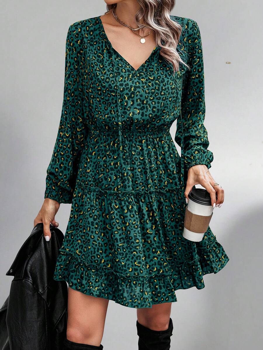 Elevate your autumn wardrobe with this stunning burgundy print dress that's equal parts sophisticated and fun. The charming tie neck detail adds a flirty touch, while the ruffled hem brings movement and personality to every step. Perfect for transitioning from casual coffee dates to evening gatherings, this fall essential combines timeless style with modern flair. The allover print creates visual interest that works beautifully with your favorite boots and accessories. Whether you're dressing up or keeping 