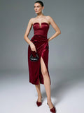 Be the life of the party with our Burgundy Velvet Wrap Hem Corset Dress! Perfect for any occasion, this elegant dress features a figure-flattering corset and a unique wrap hem that adds a touch of sophistication. The luxurious velvet fabric will make you feel like a queen, while the versatile burgundy color makes it suitable for any event. So go ahead, dress to impress with this stylish and playful piece!