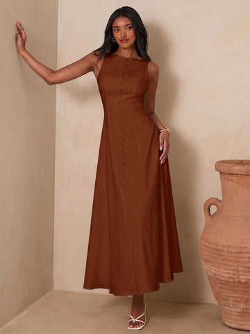 View 1 of button front sleeveless A-line midi dress with boat neck, fitted bodice, covered button trim, back zipper, and flared skirt
