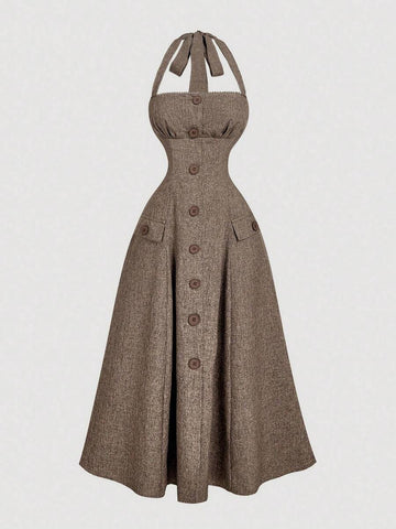 View 1 of camel halter button front midi dress with crochet trim, flap pockets, back tie, cutout back, and flared skirt
