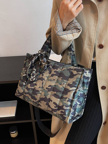 Elevate your style with Camouflage Chic: Bow-Detail Skinny Scarf & Quilted Top Handle Bag. The versatile scarf adds a touch of femininity while the spacious, quilted bag keeps your essentials organized. Perfect for any occasion, this set adds a trendy twist to any outfit.