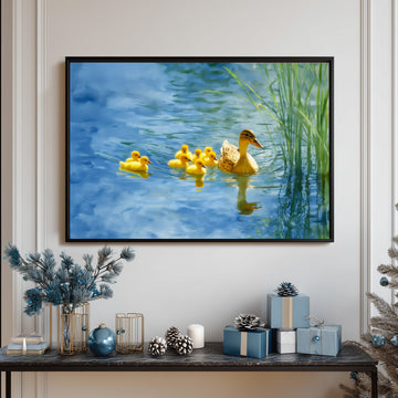 Mother Duck And Adorable Yellow Ducklings Swimming In Serene Blue Lake Nature Wall Art