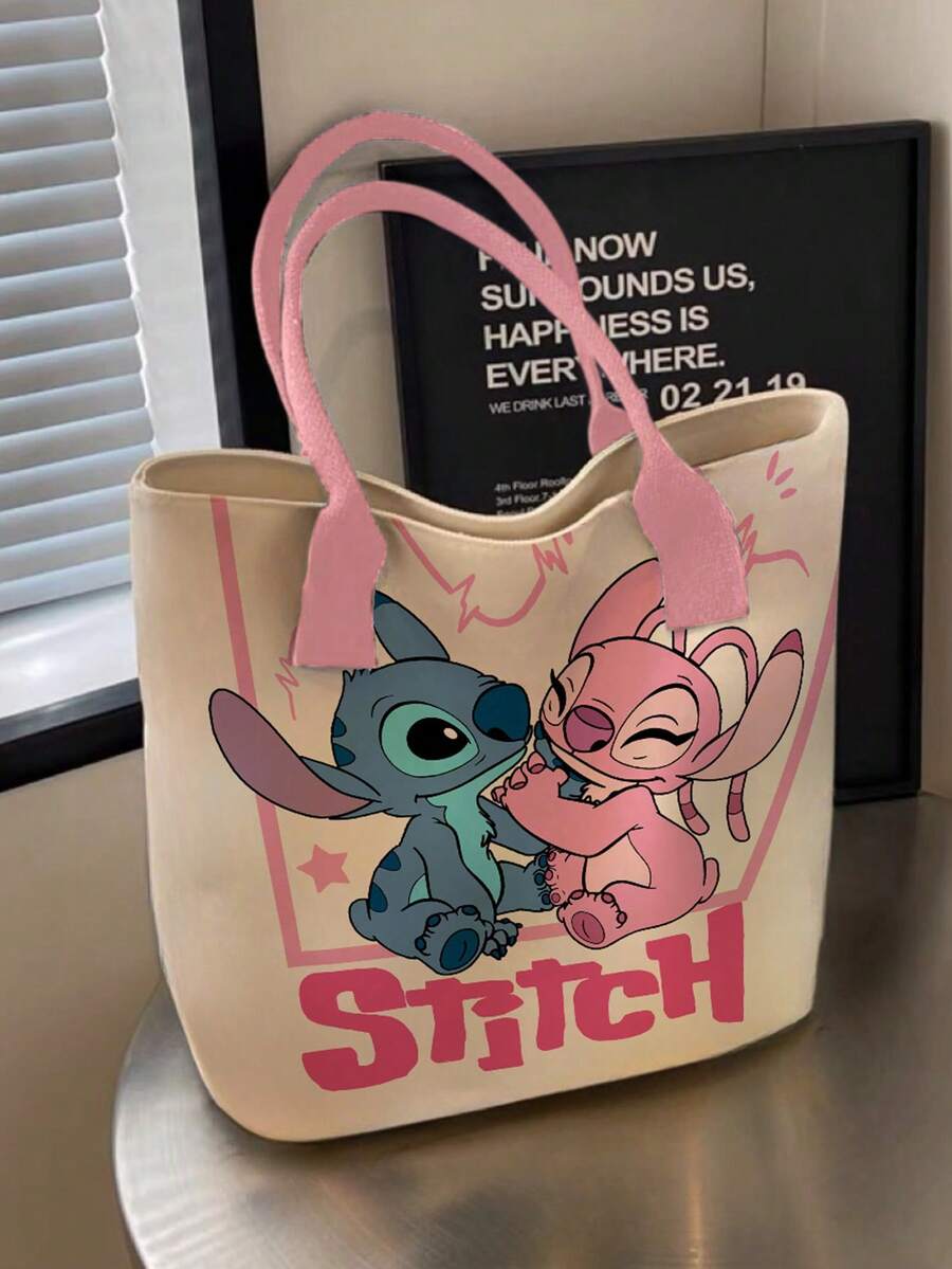 Cream Stitch tote bag with pink handles showing Stitch and Angel print with pink STITCH text