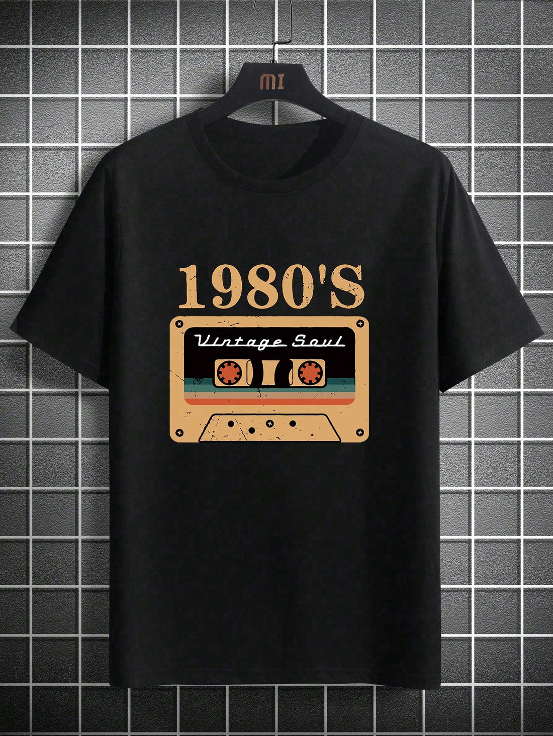 Get ready to turn heads with the Casual Cool: Men's Summer Graphic Tee! Featuring a unique letter and tape print, this tee offers a fun and playful twist on a classic summer staple. Stay cool and stylish all season long with this must-have addition to your wardrobe.