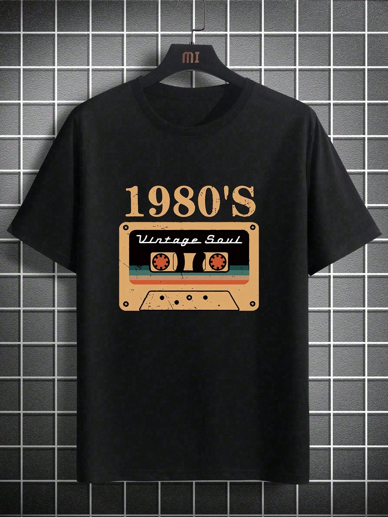 Get ready to turn heads with the Casual Cool: Men's Summer Graphic Tee! Featuring a unique letter and tape print, this tee offers a fun and playful twist on a classic summer staple. Stay cool and stylish all season long with this must-have addition to your wardrobe.