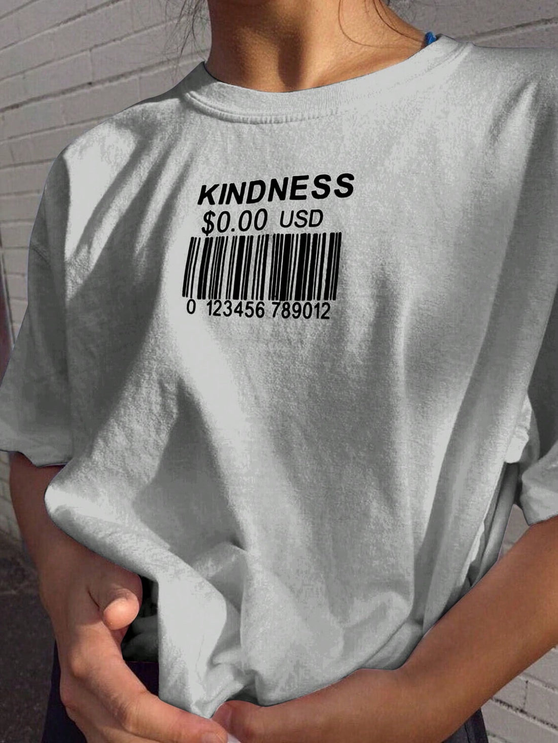 This Casual Letter Print Drop Shoulder T-Shirt for Women provides a stylish and comfortable option for everyday wear. Made with a loose drop shoulder design and featuring a trendy letter print, this shirt is perfect for casual outings and lounging.