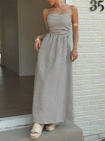Effortlessly rock the summer with this Casual Striped Spaghetti Strap Maxi Dress. With its playful stripes and comfortable spaghetti straps, this dress is perfect for any casual occasion. Never sacrifice style for comfort again with this must-have piece for your summer wardrobe.