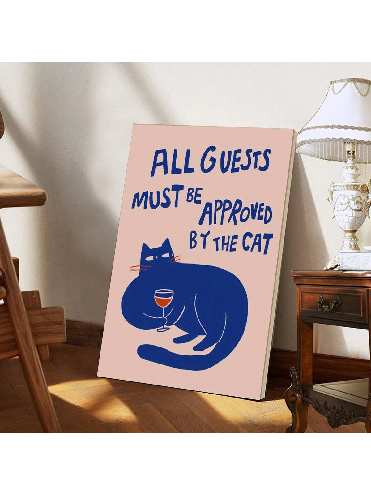 Make your decor purr-fect with this adorable canvas wall art for cat lovers. Featuring a playful kitten and the humorous phrase 'Cat-Approved Guests Only', this unique piece will add a touch of quirkiness to any room. A must-have for any feline enthusiast!