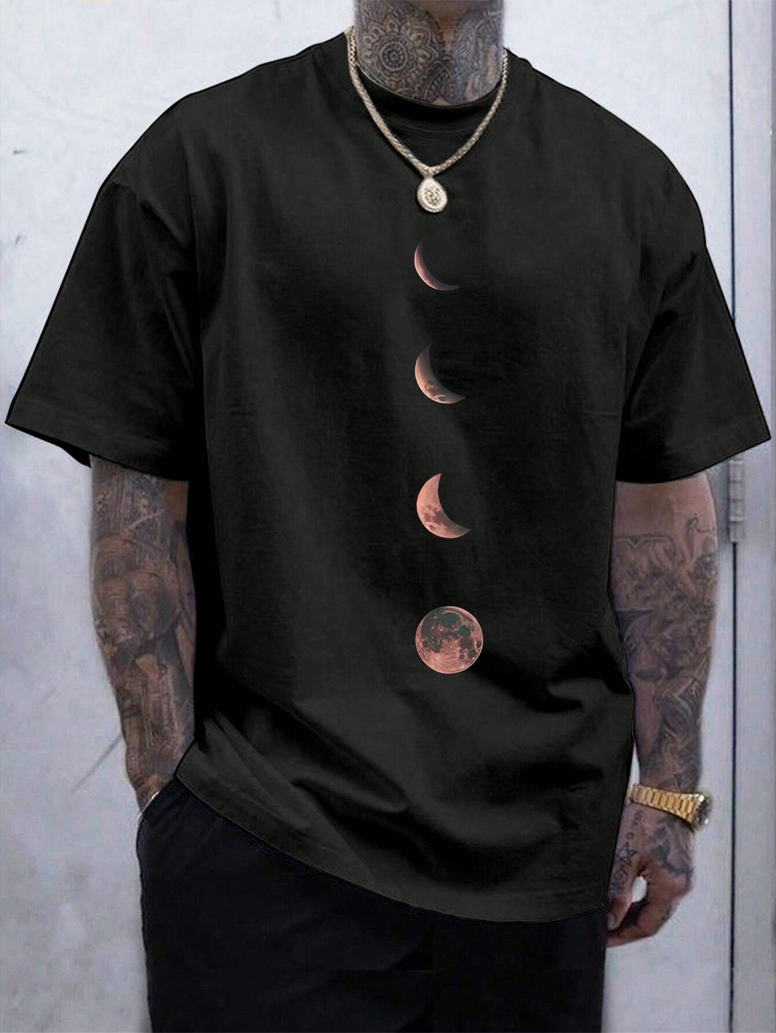 Add a touch of celestial style to your wardrobe with this Moon Pattern T-Shirt. Featuring a comfortable round neck and short sleeves, this quirky shirt is perfect for astronomy enthusiasts and fashion-forward individuals alike. Embrace the moon's energy and show off your unique sense of style with this one-of-a-kind shirt.