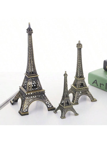Experience a touch of Paris with our Charming 3-Piece Eiffel Tower Metal Model Set. Crafted with elegant European style, this metal model set adds a timeless and sophisticated touch to any home decor. Perfect for adding a touch of sophistication to your living space.