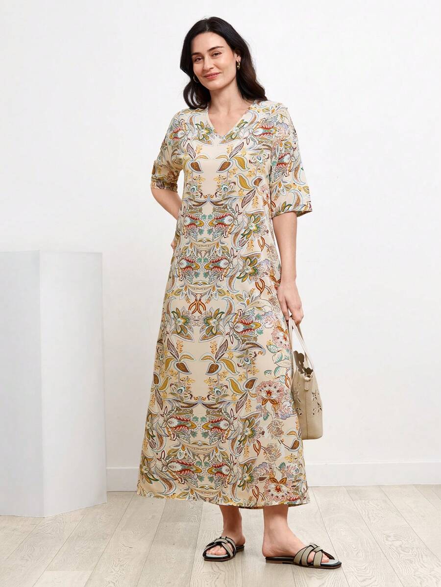 Embrace summer with this charming tunic dress! Featuring an allover floral print, it's perfect for any tea party style. Effortlessly stylish and comfortable, it's the ideal choice for the season. Get ready to turn heads and stand out in this must-have dress.