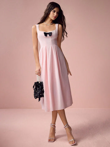 Get ready to charm your way through spring and summer celebrations with this elegant mid-length dress. Adorned with a charming bow, this dress will surely make a statement. Perfect for any occasion, it's the ultimate combination of style and grace. (Bow and dress not included. Just kidding! They totally are.)