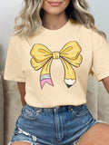 This Charming Bow Print Casual T-Shirt for Women is the perfect essential for your summer wardrobe. The charming bow print adds a playful touch to this versatile t-shirt, making it suitable for both casual and dressier occasions. Made with comfort in mind, it is the perfect combination of style and ease.