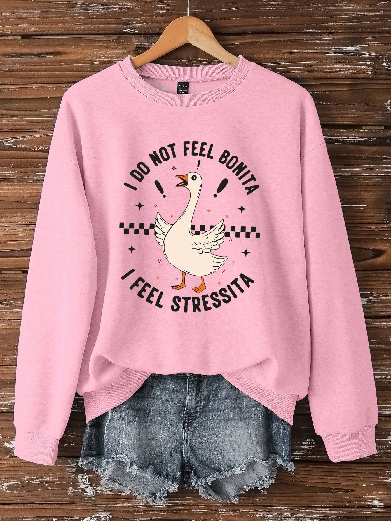 Introducing our Charming Cartoon Duck Graphic Sweatshirt, perfect for the cool autumn and winter season. Get cozy with its casual style and add a touch of charm with the adorable duck graphic. Stand out from the crowd with this unique and playful sweatshirt. Quack, quack!