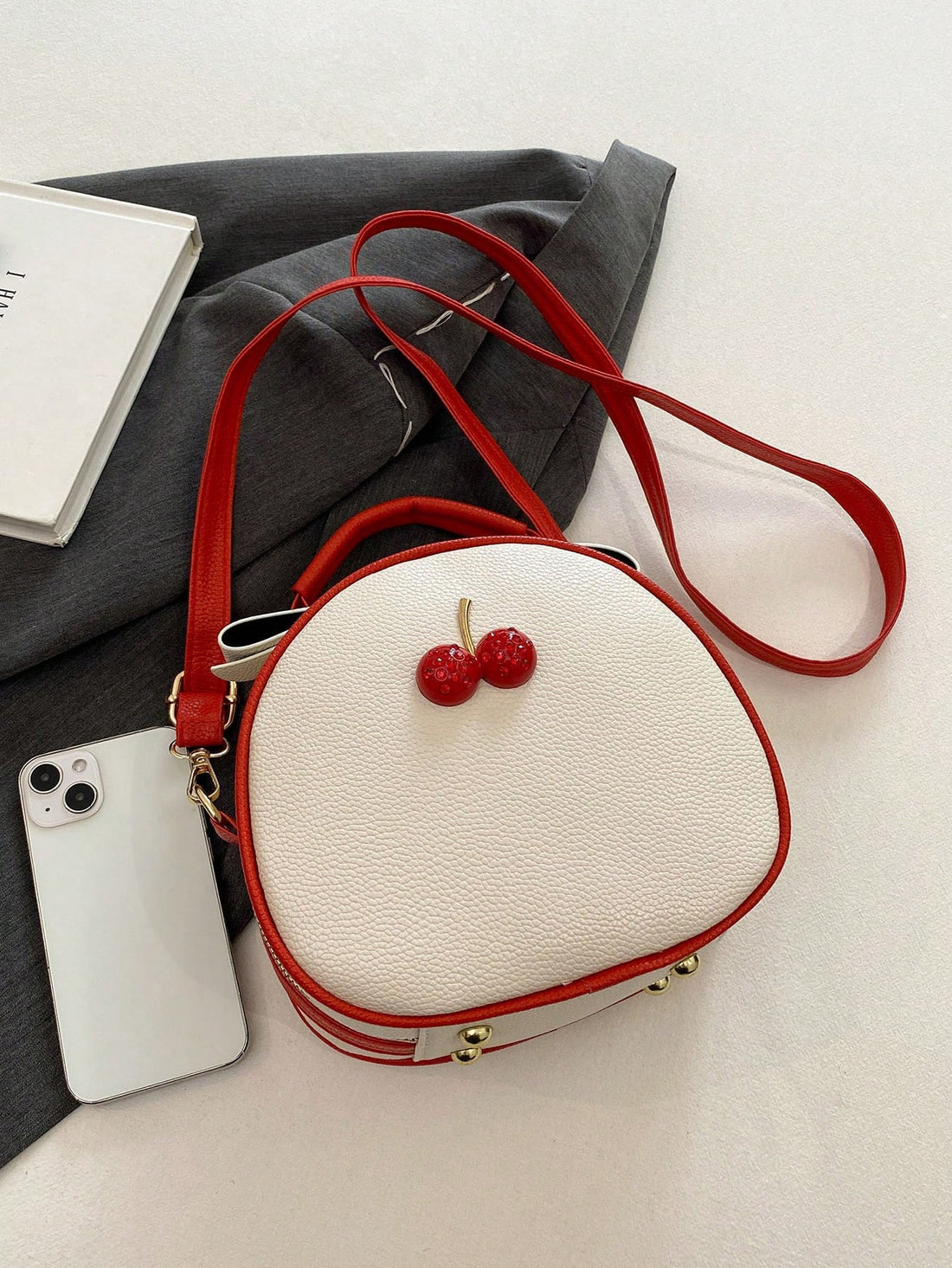 Get ready to add a pop of fun to your everyday look with our Charming Cherry Print Diagonal Crossbody Bag! Featuring a playful cherry print and convenient crossbody design, this bag is perfect for all your adventures. Stay stylish while carrying your essentials in a charming way!