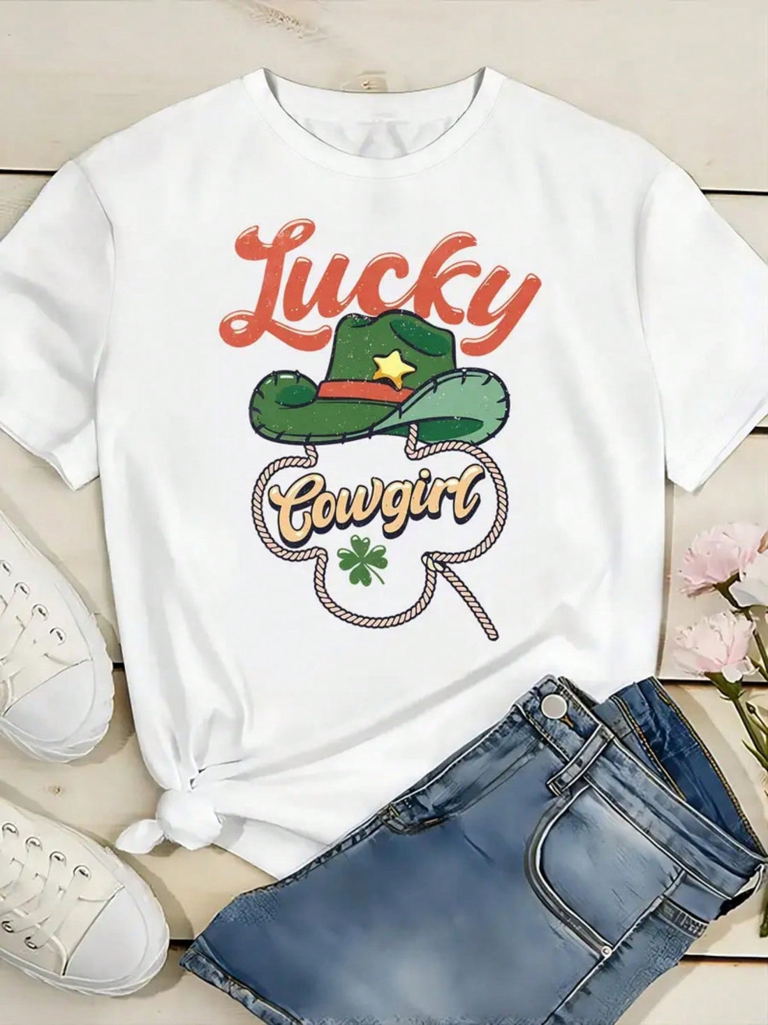 Stay stylish and lucky with our Charming Clover t-shirt! This women's tee features a fun four-leaf clover print, symbolizing good fortune. With a playful tone and quirky design, this shirt is perfect for anyone looking to add a touch of luck to their wardrobe.