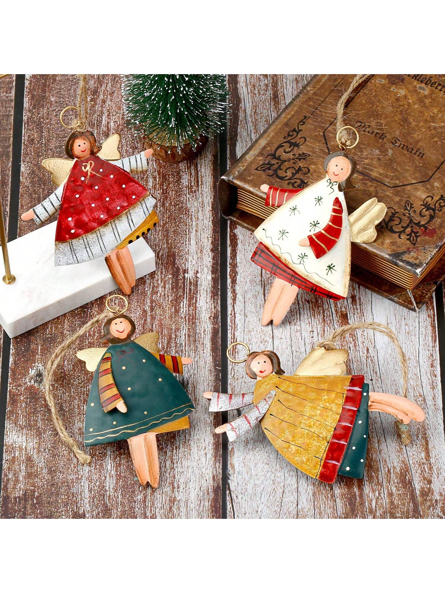 Add a touch of rustic charm to your holiday decor with these Charming Countryside Double-Sided Metal Christmas Tree Ornaments. This set of four Santa Claus pendants are handcrafted from durable metal and feature intricate detailing on both sides. Perfect for adding a festive touch to your tree or holiday displays.