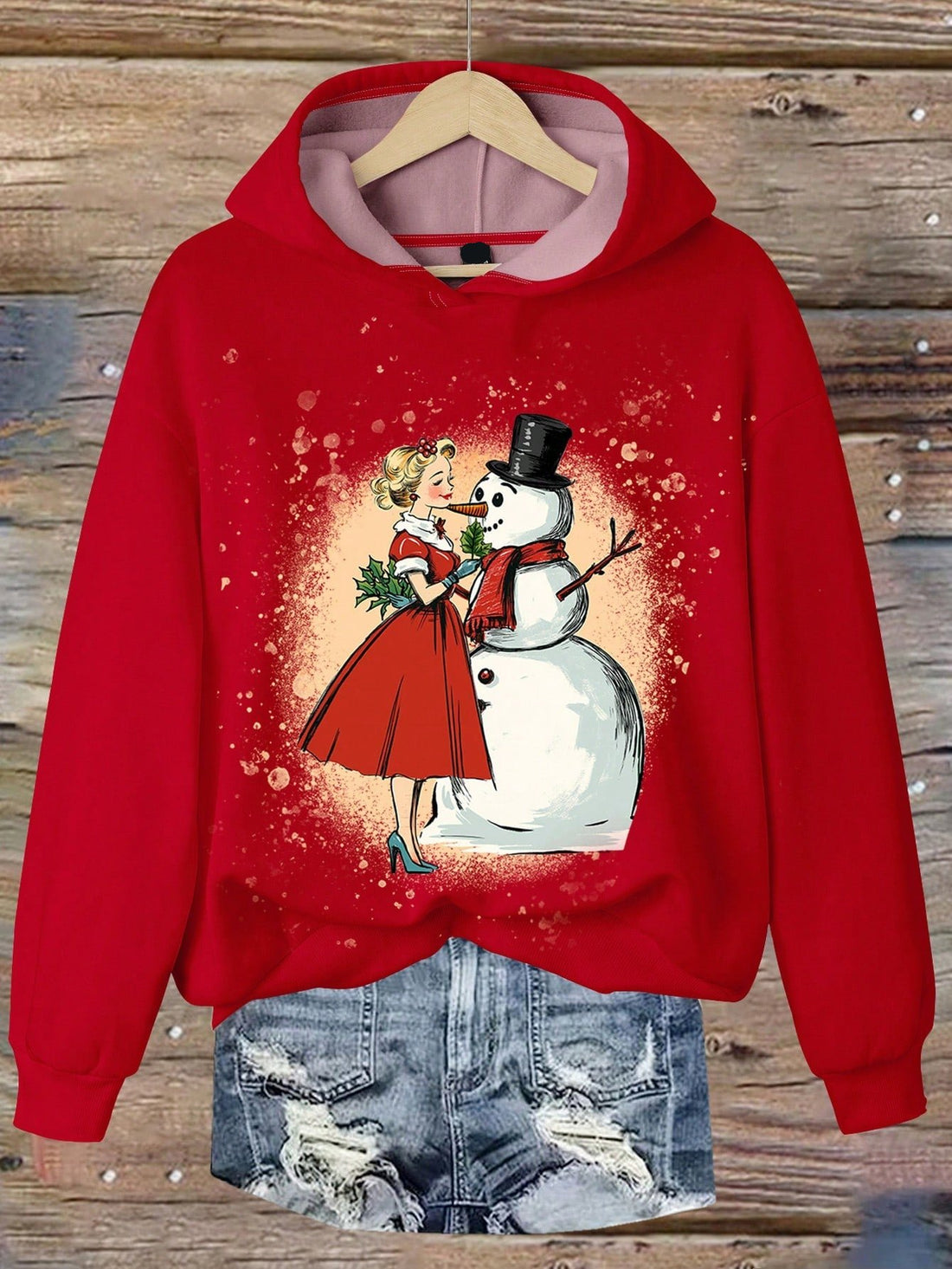 Add some festive cheer to your little girl's wardrobe with our Charming Dancing Snowman Hoodie. Crafted with warmth and comfort in mind, it's the perfect addition for cozy autumn and winter celebrations. Let her dance and play while staying warm and stylish!