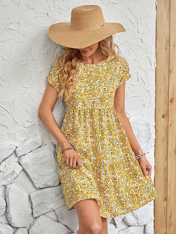 Effortlessly elegant, this Charming Ditsy Floral Batwing Sleeve Smock Dress adds a touch of playful sophistication to your wardrobe. The flowy batwing sleeves and ditsy floral print create a whimsical look, while the smock design flatters your figure. Perfect for a fun and carefree day out!