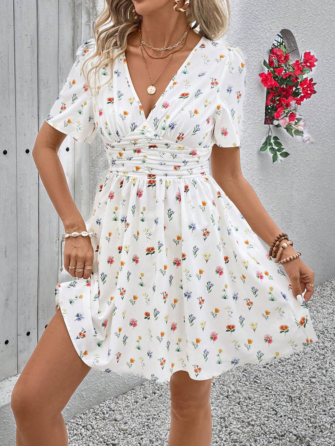 Effortlessly achieve a charming summer look with our Ditsy Floral Cinching Waist Dress. The elegant floral print and cinched waist create a flattering silhouette, perfect for any occasion. Stay stylish and comfortable with this must-have dress.