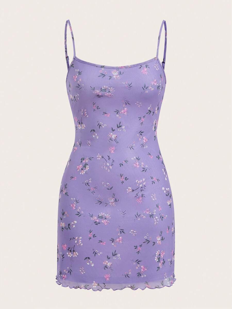 Get ready to add some charm to your summer wardrobe with our Charming Ditsy Floral Print Cami Dress! The cute lettuce trim adds a fun touch to this flowy, lightweight dress. Perfect for a sunny day out, this dress will have you feeling charming and stylish all season long.