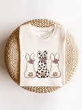 Hop into style this Easter with our Charming Rabbit T-Shirt! Featuring a triple print design and comfortable round neck fit, this shirt is perfect for any festive occasion. Embrace your playful side with this quirky addition to your wardrobe.