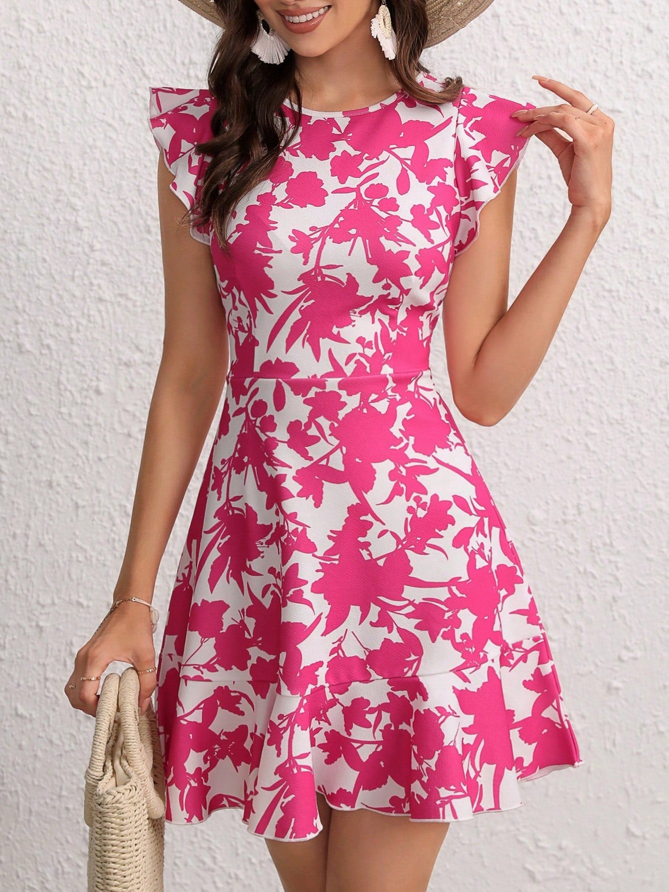 Effortlessly exude elegance in our Charming Floral Ruffle Trim Dress. Crafted with delicate ruffle accents, this dress offers a charming floral design for a feminine touch. Perfect for any occasion, you'll feel effortlessly dressed up and confident in this timeless piece.