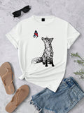 Add a touch of whimsy to your wardrobe with our Charming Fox and Butterfly Graphic Tee for Women. Made with a casual round neck and short sleeves, this tee features a playful design of a fox and butterfly. Perfect for any occasion, this tee is sure to charm with its comfortable fit and stylish print.