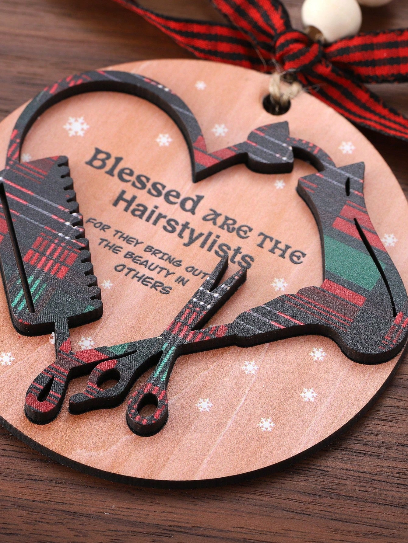 Celebrate the hairstylists in your life with our Charming Hairstylist Christmas Ornament. Made for hairdressers, this ornament is the perfect gift for the holiday season. Reflecting their passion and expertise, it's a thoughtful and unique way to show your appreciation.