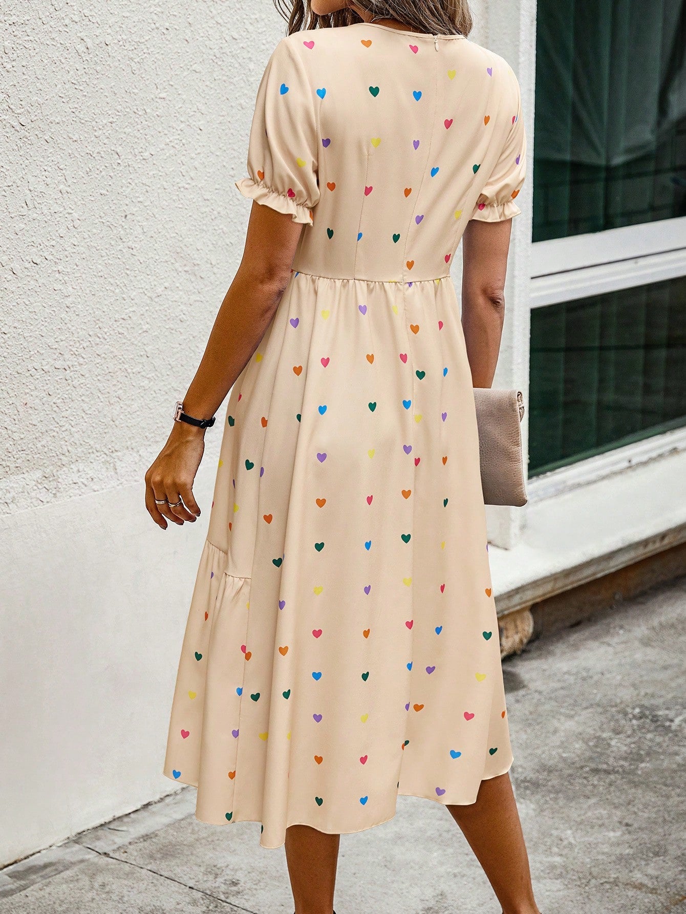 Get ready for a swoon-worthy Valentine's Day with our Charming Heart Print Date Dress. This dress is designed to turn heads with its charming heart print, perfect for a romantic evening out. Say "I love you" without saying a word in this flirty and fun dress.