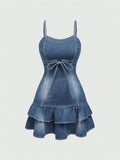 Expertly crafted and charming, this Kawaii Denim Dress features delicate spaghetti straps and a playful ruffle hem. Made from high-quality denim, it's perfect for any occasion and exudes a youthful and modern style. Elevate your wardrobe with this must-have piece and stand out with its unique and stylish design.