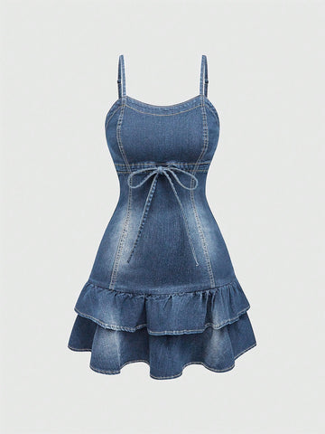Expertly crafted and charming, this Kawaii Denim Dress features delicate spaghetti straps and a playful ruffle hem. Made from high-quality denim, it's perfect for any occasion and exudes a youthful and modern style. Elevate your wardrobe with this must-have piece and stand out with its unique and stylish design.