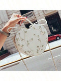 Add a touch of romance to your look with this Charming Lace Heart-Shaped Crossbody Bag. Delicately embroidered and perfectly heart-shaped, it’s the ideal playful accessory for stylish ladies who want to stand out. Lightweight and easy to carry, it keeps your essentials close while adding a sweet, feminine flair to any outfit.