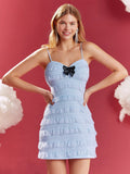 Add some charm to your wardrobe with this multi-layer lace ruffle cami dress. The enchanting bow details add a touch of whimsy to this already delightful dress. Perfect for a playful and fun look!