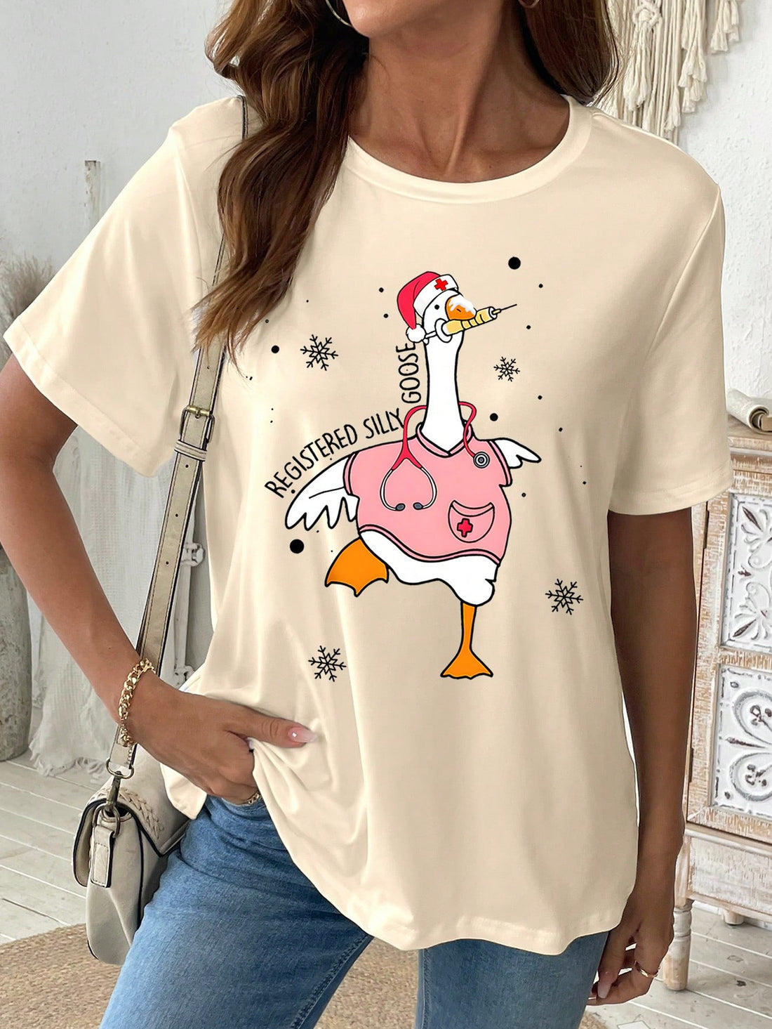 Stay comfortable and stylish this spring and summer with our Charming Nurse-Approved Duck & Snowflake Print Tee. Expert-approved for nurses, this tee features a charming print that will add a touch of whimsy to any outfit. Made with lightweight materials for maximum comfort, it's perfect for any season.