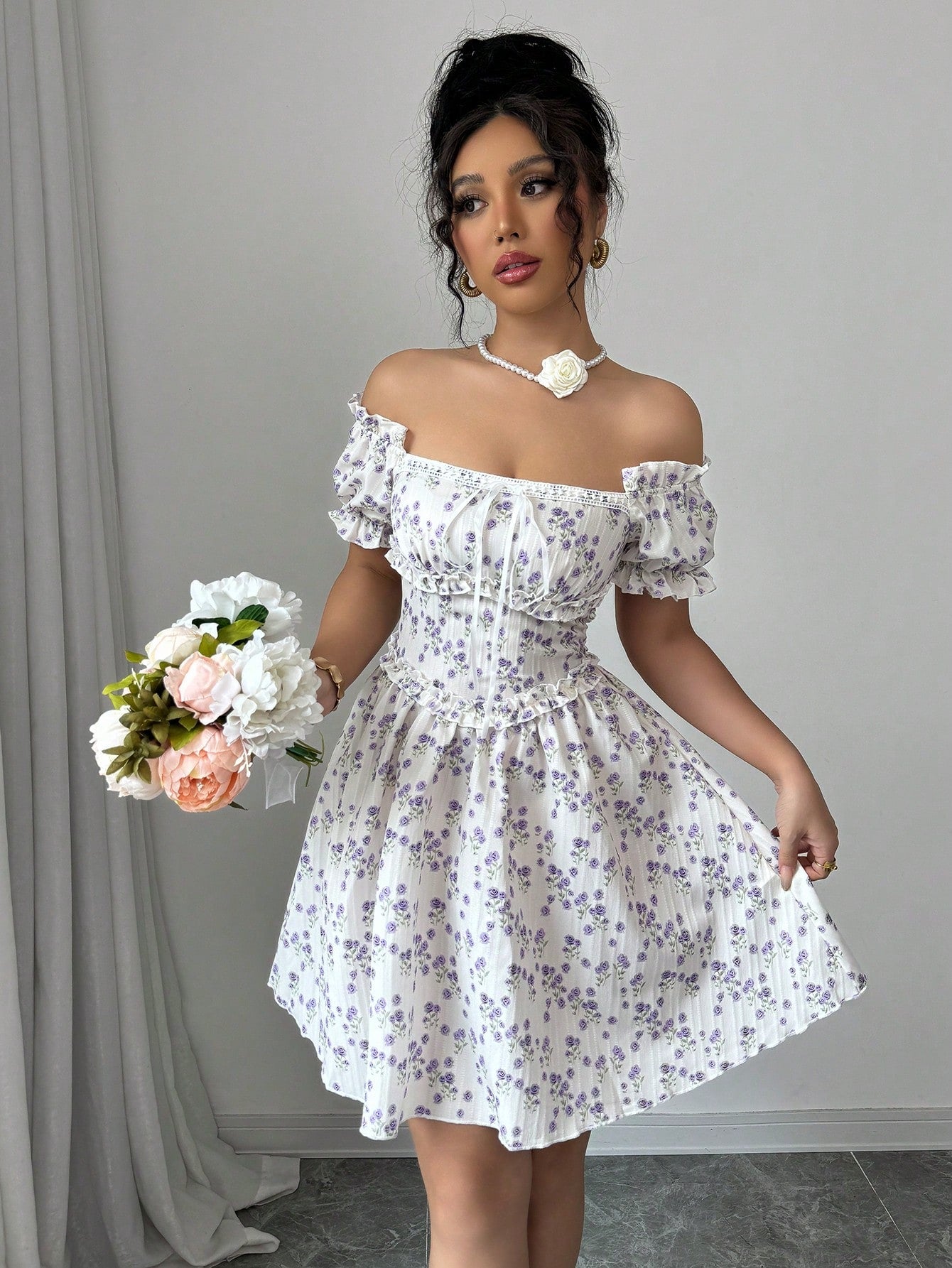 Upgrade your wardrobe with this charming off-shoulder floral mini dress! The playful puff sleeves add a touch of elegance while the off-shoulder design keeps it fun and flirty. Perfect for any occasion, this dress will surely turn heads wherever you go.