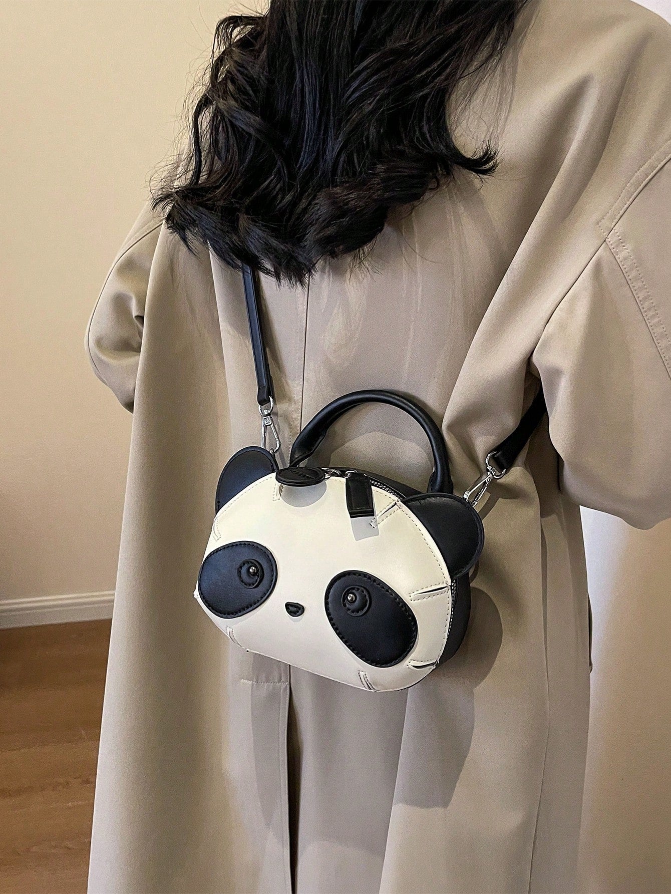 Get ready to add some charm to your wardrobe with our Charming Panda Shoulder Bag! This stylish and versatile crossbody accessory is the perfect addition to any outfit. With its unique panda design, you'll stand out in any crowd. Plus, its spacious interior allows for easy organization and on-the-go convenience.