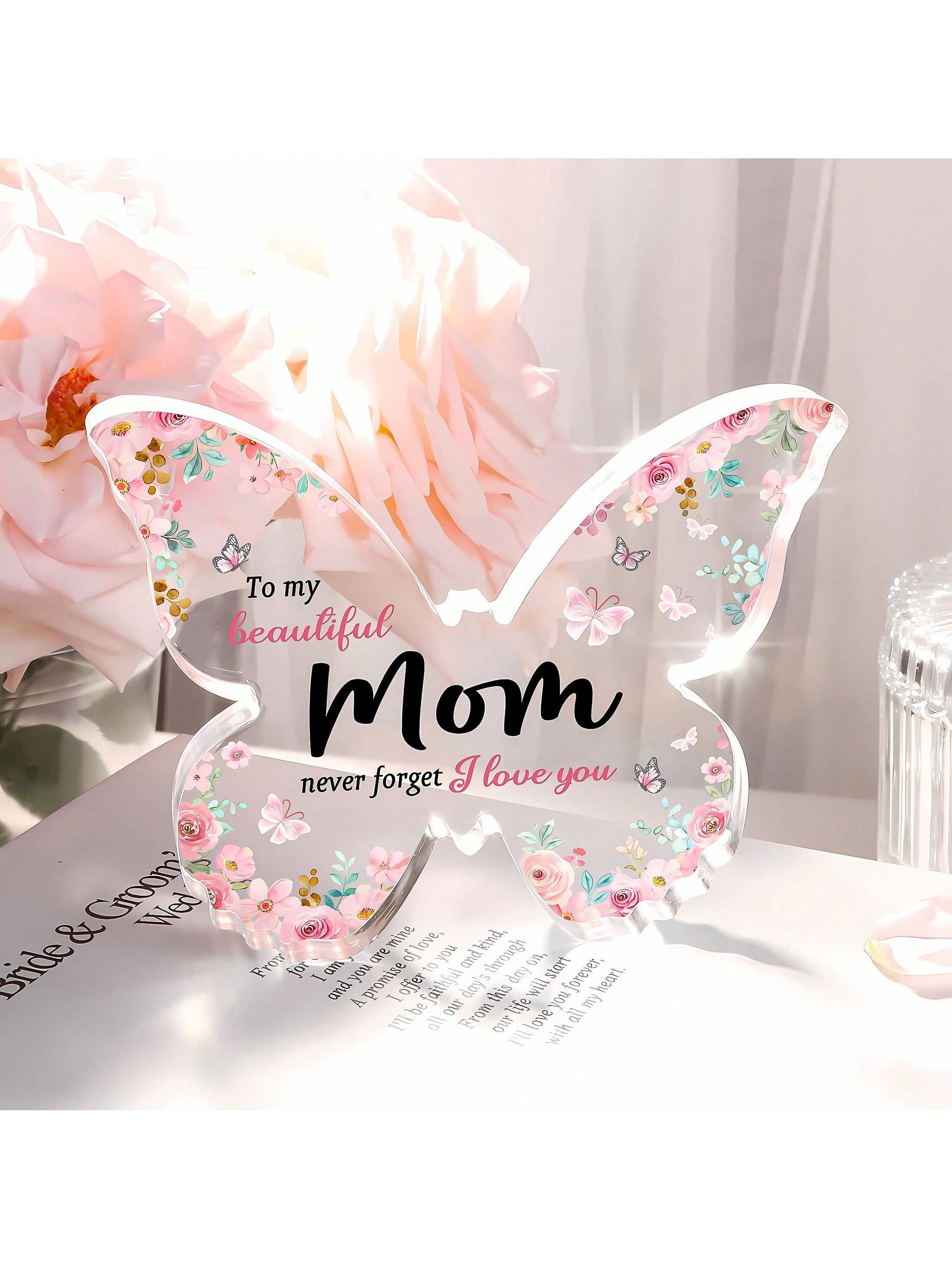 This charming pink butterfly acrylic plaque is the perfect gift for mom's special occasions! The delicate butterfly design adds a touch of beauty to any space, making it a lovely addition to her home decor. Show mom your love and appreciation with this unique and thoughtful gift.