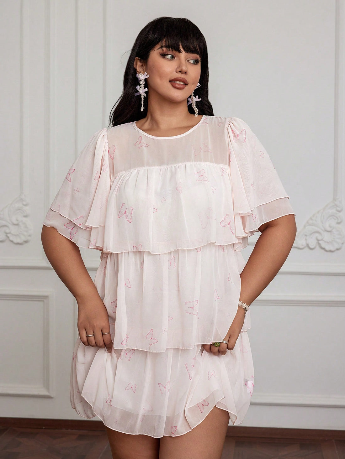 Embrace your playful side with this charming plus size dress featuring a delightful butterfly print and whimsical puff sleeves. Designed to flatter your curves while adding a touch of sweetness, it’s perfect for sunny days and casual outings. Let your style take flight with this fun and flirty dress that’s as comfortable as it is cute.