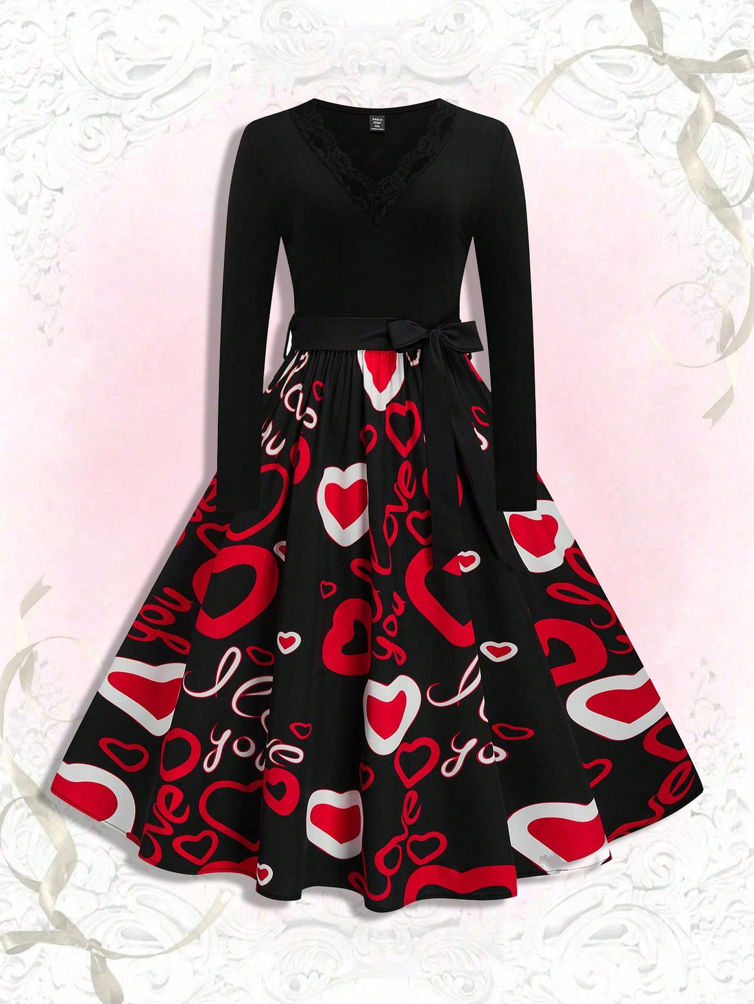 Rock your Valentine's Day look with this Charming Plus Size V-Neck Dress. The delicate lace trim adds a touch of elegance, while the playful floral heart print adds a fun twist. Perfect for a romantic night out or a Galentine's Day celebration. (No more boring V-Day outfits!)
