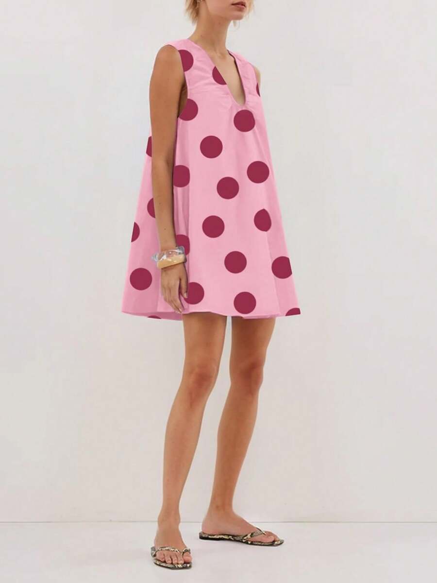Embrace effortless charm with this polka dot babydoll mini dress. Featuring a flattering V-neckline and loose, comfortable fit, it's perfect for beach days, vacations, and warm-weather adventures. The sleeveless design and straight hem create a playful silhouette that works beautifully for casual outings or festive occasions. Crafted in soft fabric with a natural mid-waist, this cute geometric-patterned piece in pink is your go-to for relaxed, stylish comfort.
