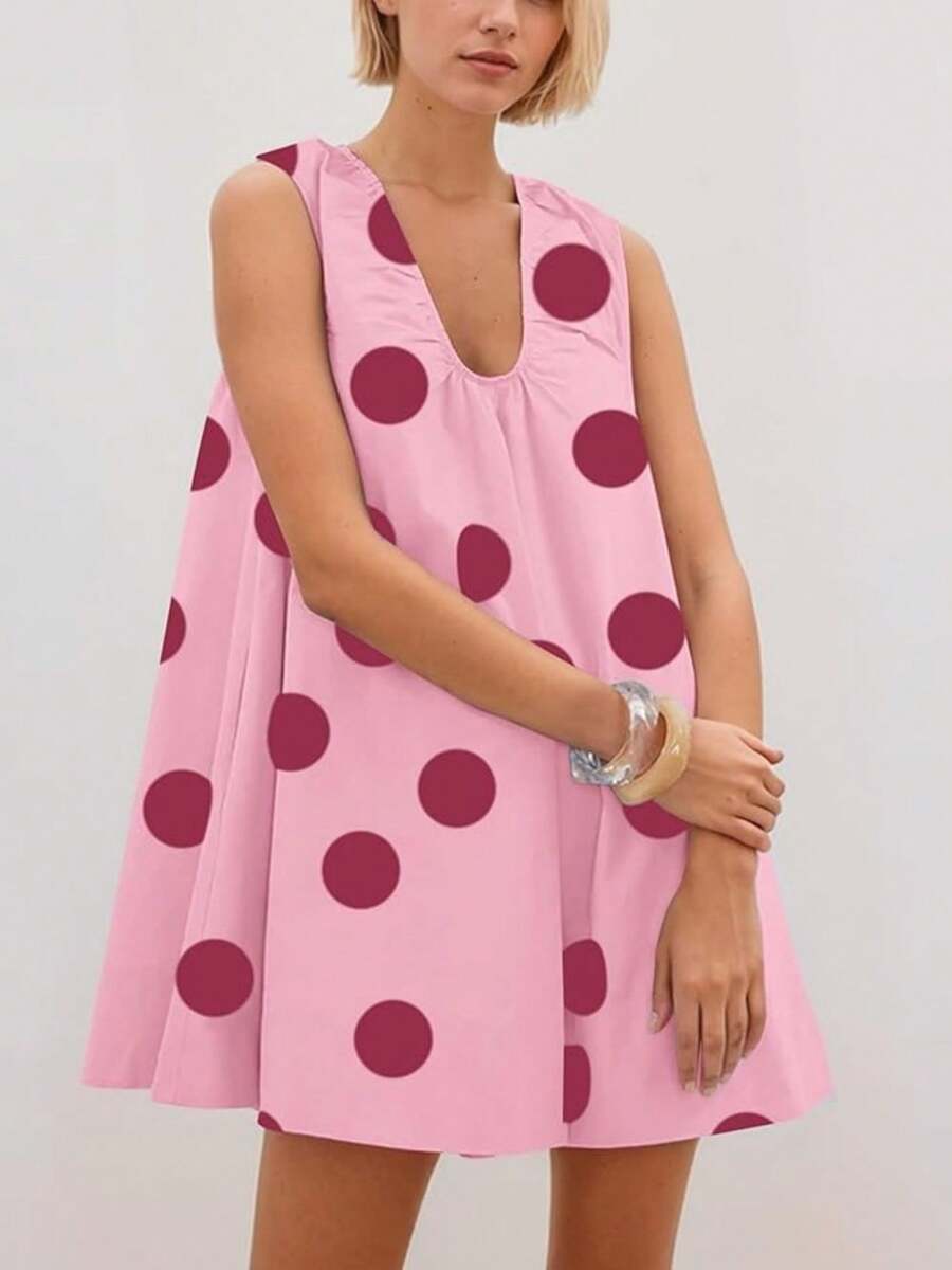 Embrace effortless charm with this polka dot babydoll mini dress. Featuring a flattering V-neckline and loose, comfortable fit, it's perfect for beach days, vacations, and warm-weather adventures. The sleeveless design and straight hem create a playful silhouette that works beautifully for casual outings or festive occasions. Crafted in soft fabric with a natural mid-waist, this cute geometric-patterned piece in pink is your go-to for relaxed, stylish comfort.