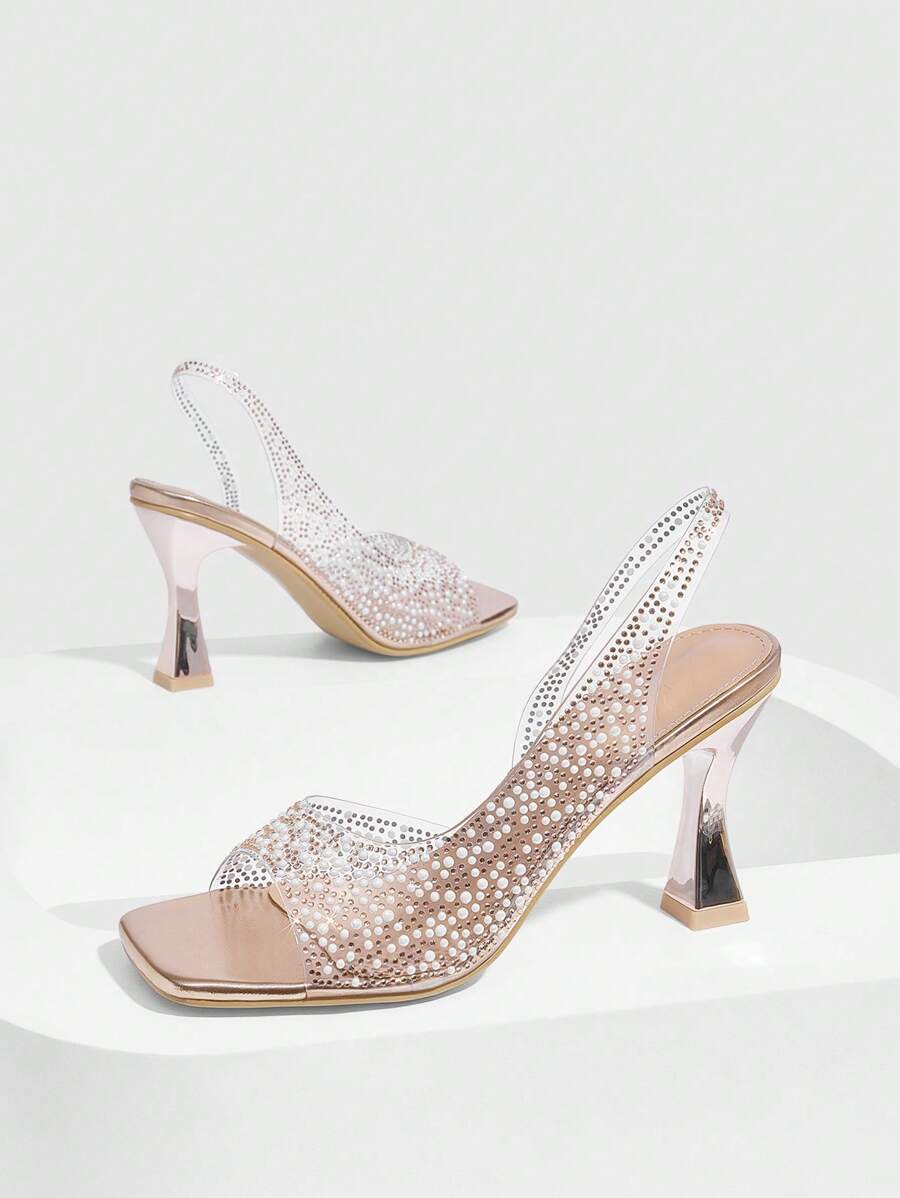 Step into elegance with these charming rhinestone-adorned chunky heel sandals, the perfect companion for your spring and summer celebrations. Featuring sparkling rhinestone embellishments that catch the light beautifully, these sandals combine glamour with comfort. The sturdy chunky heel provides excellent support and stability, making them ideal for outdoor gatherings, weddings, and special occasions. 
