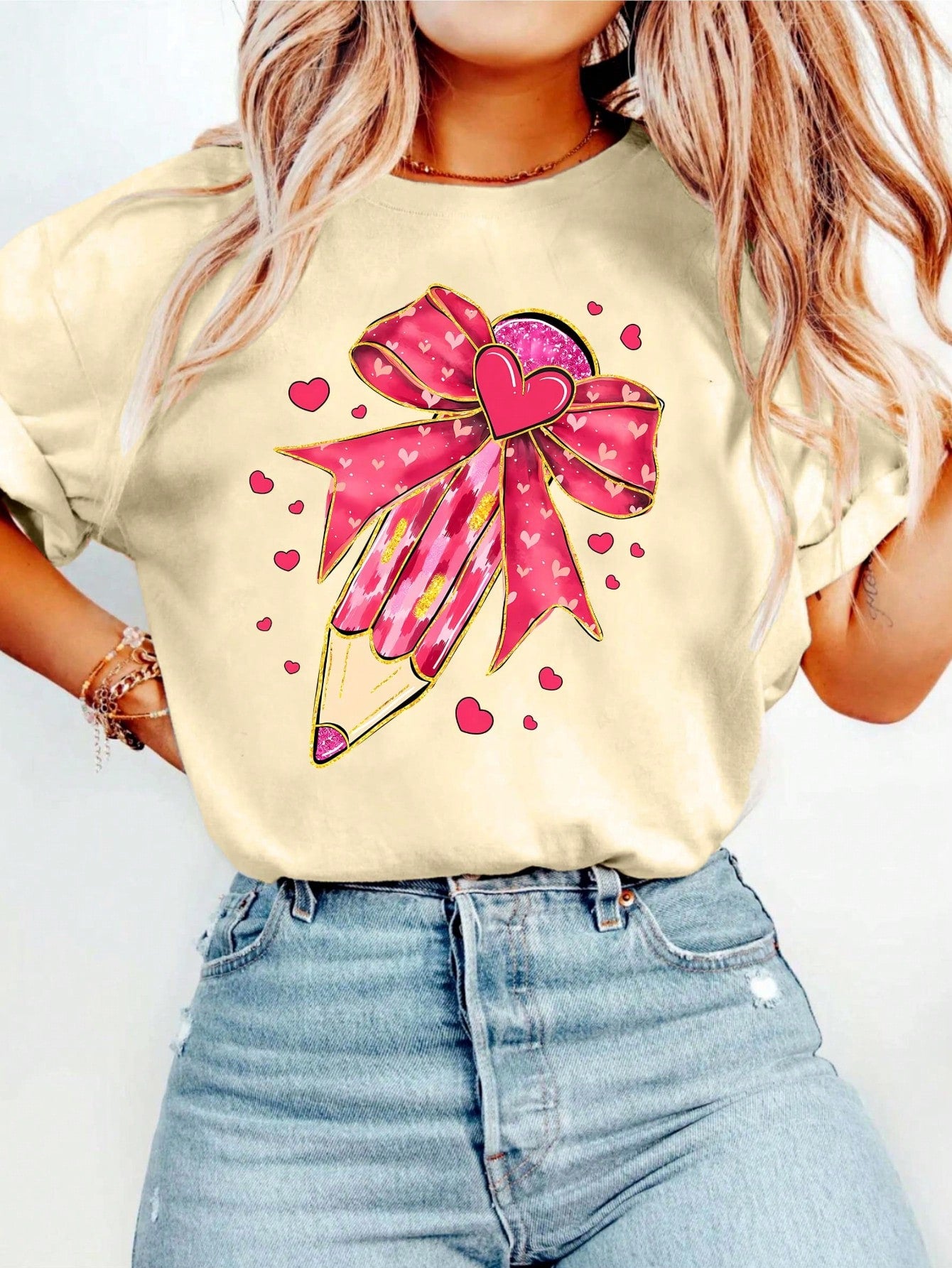 Get ready to charm your students with this Flirty Bow Pencil T-Shirt, perfect for Spring/Summer! Ideal for the fun-loving teacher, this shirt features a playful bow and pencil design. You won't be able to resist its charm!